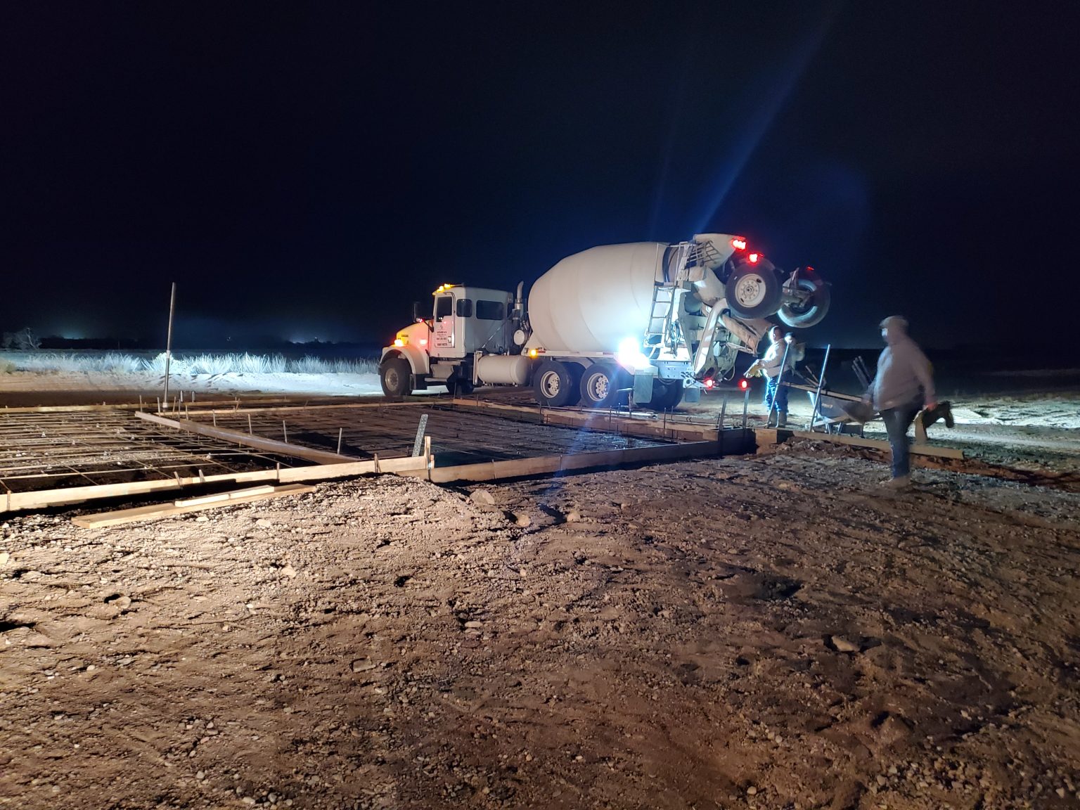 Night time, concrete forms setup, ready-mix truck, Coolidge Arizona concrete job.