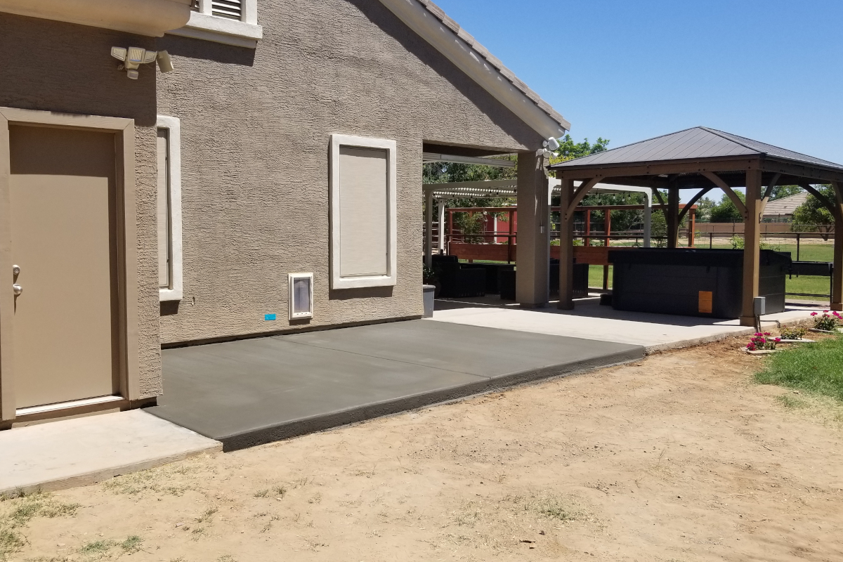 Patio on the side of the house for a dog run in Queen Creek, Arizona