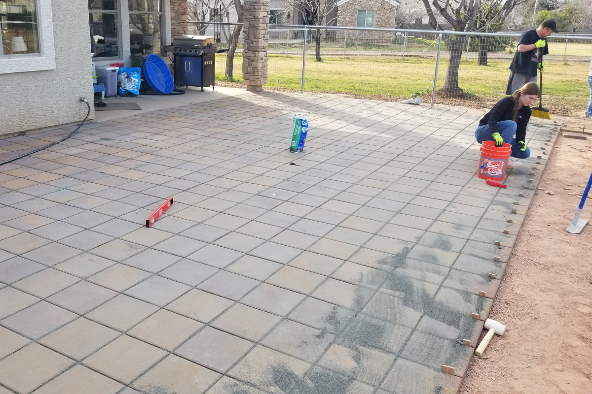 Cornerstone Concrete construction crew installing pavers