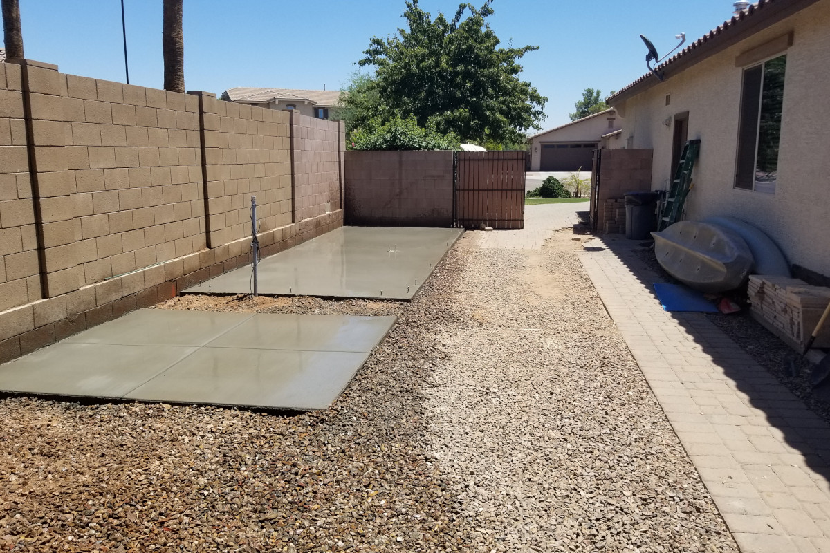 Finished concrete shed pad and added patio area in Chandler, Arizona.