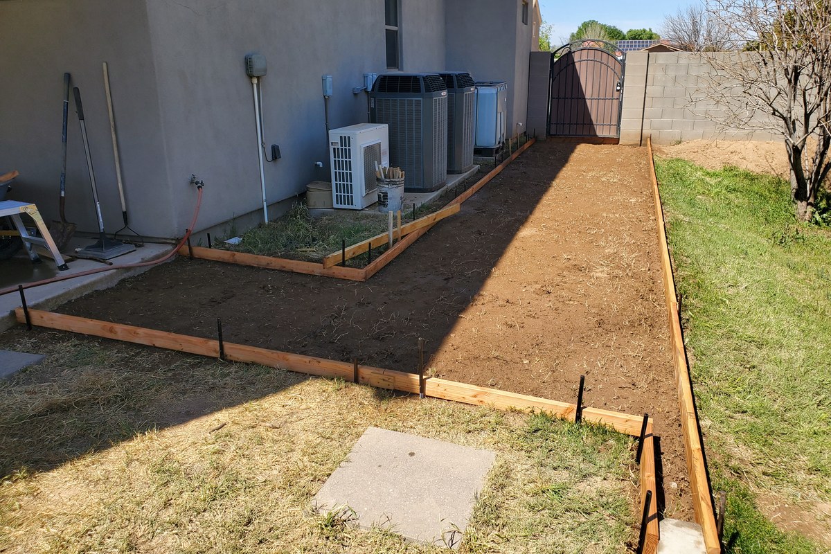 Full layout overview of the formed sidewalk addition and landing area in Gilbert.