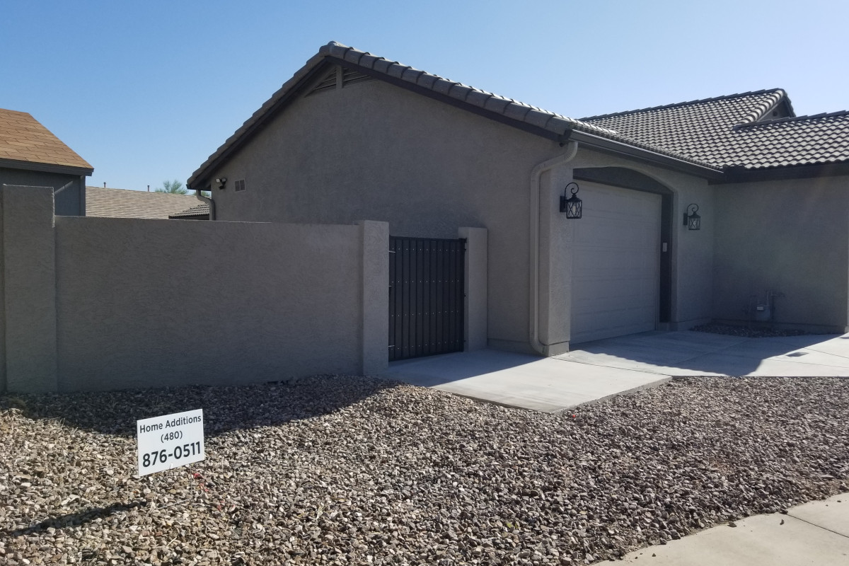 Finished angle view of the new garage addition and surrounding concrete work in Gilbert.