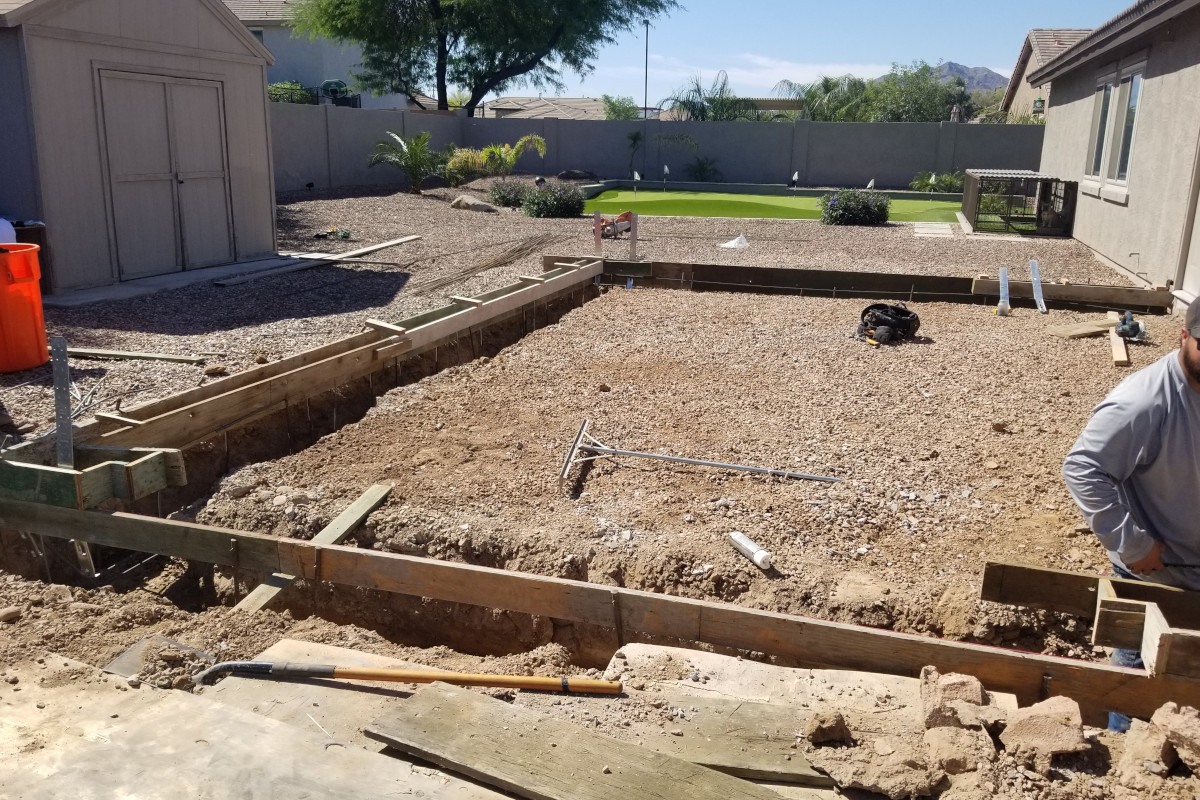 Formed footings and garage pad area for a Gilbert home addition project.