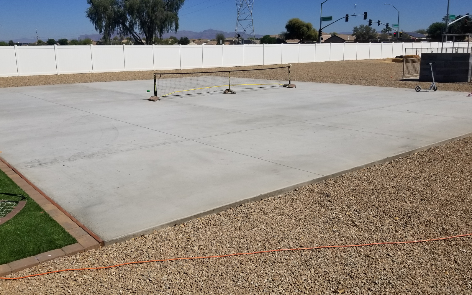 Completed backyard concrete play court at a San Tan Valley property