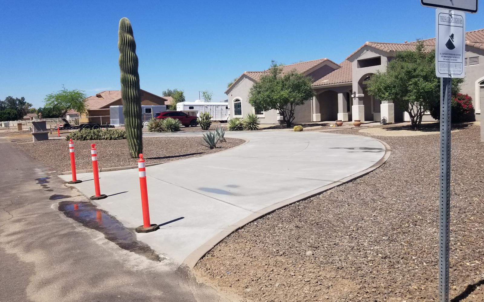 Completed circular driveway connecting a San Tan Valley home to the street