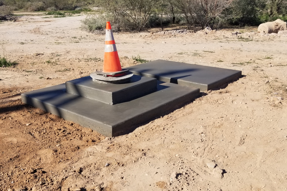 Completed concrete job for a well head.